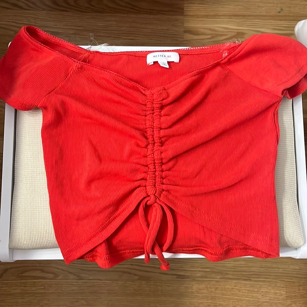 red top without tags but never worn